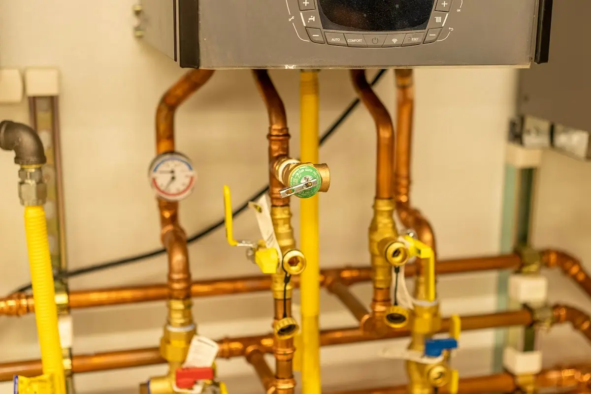 Licensed technician providing Backflow Prevention for a homeowner in Brighton